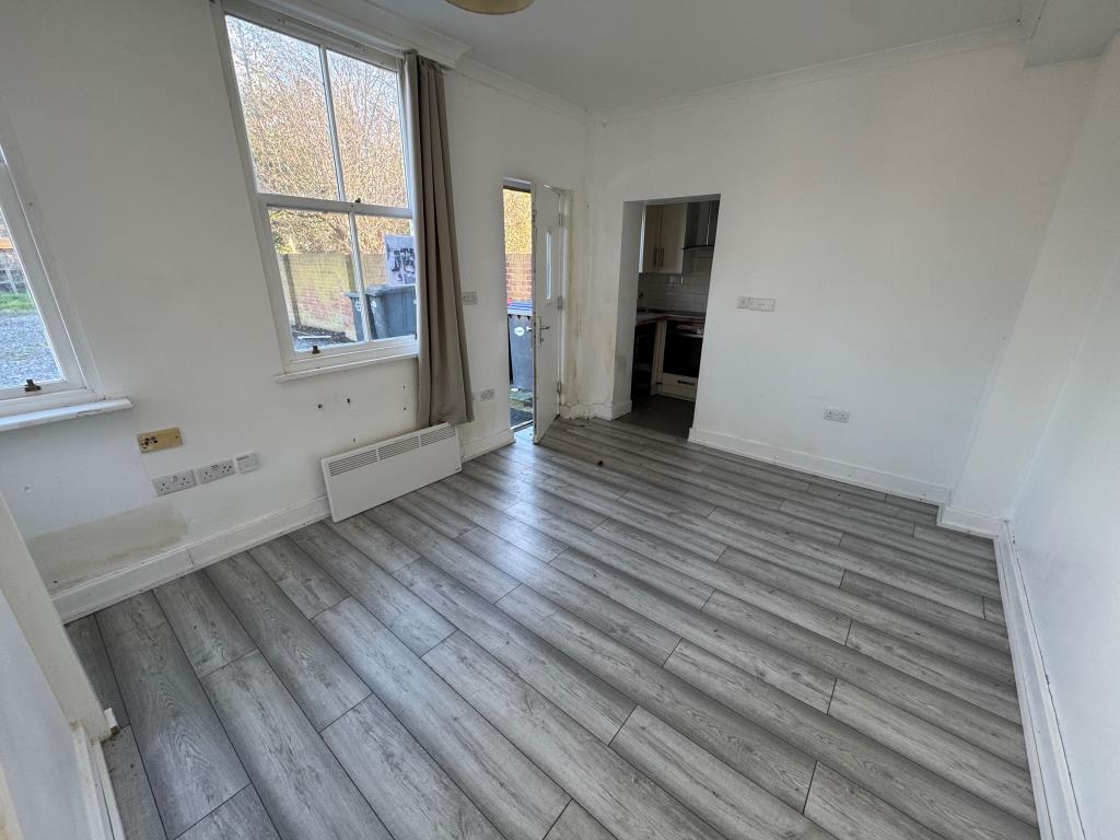 Lot: 97 - FREEHOLD BLOCK OF FIVE ONE-BEDROOM APARTMENTS - Flat 1 living room